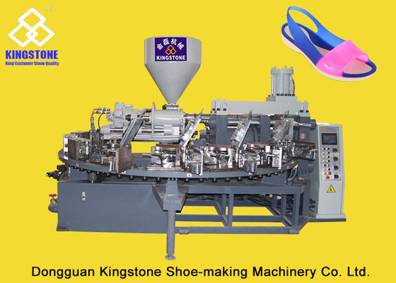 Un sandalo rotatorio automatico di colore che fa macchina per le scarpe di plastica della gelatina